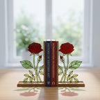 Handmade stained glass red rose flower bookends on solid wood bases casting beautiful colorful shadows, romantic anniversary and book lover gift.