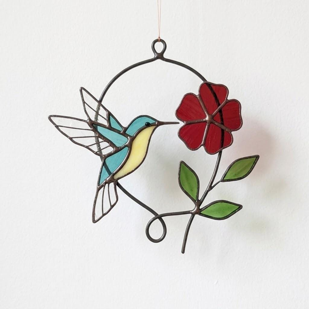 Handmade stained glass blue hummingbird and red spring flower suncatcher in copper wire hoop, floral window hanging gift for mother's day.