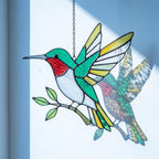 Handmade stained glass flying hummingbird and red flower hoop suncatcher, vibrant spring window hanging and memorial sympathy gift for mom.