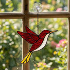 Handmade stained glass hummingbird suncatchers in colorful blue green red purple and yellow, vibrant spring window hanging and meaningful mother's day memorial gift.