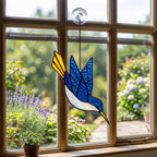 Handmade stained glass hummingbird suncatchers in colorful blue green red purple and yellow, vibrant spring window hanging and meaningful mother's day memorial gift.
