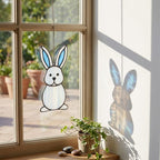 Handmade stained glass cute bunny rabbit suncatcher in iridescent pastel colors, perfect easter window decor and spring nursery room wall hanging gift.