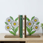 Handmade stained glass white daisy flower bookends on solid wood bases holding books on a sunlit desk, beautiful cottagecore shelf decor and book lover gift.