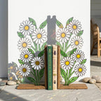 Handmade stained glass white daisy flower bookends on solid wood bases holding books on a sunlit desk, beautiful cottagecore shelf decor and book lover gift.
