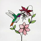 Handmade stained glass hummingbird and pink fuchsia flower plant stake decor in a potted plant, beautiful spring suncatcher and Mother's Day gift.