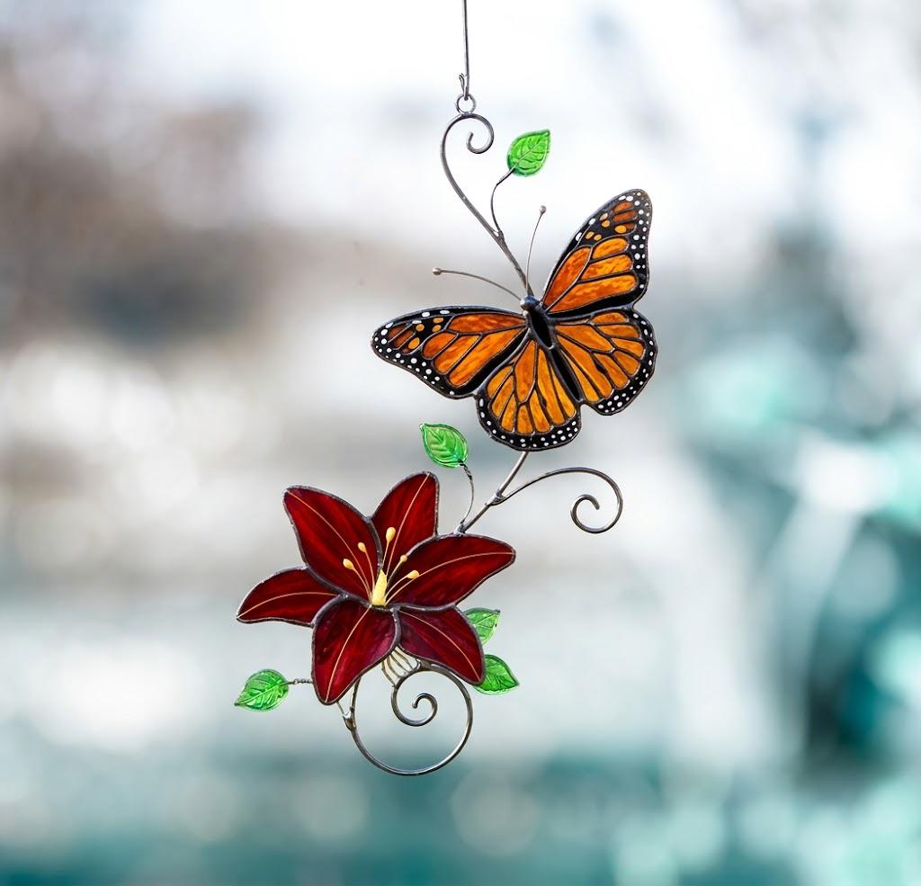 Handmade stained glass monarch butterfly and pink lily flower suncatcher, perfect spring window art, fairycore room decor and gift for grandma.