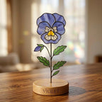 Handcrafted 2D flat stained glass birth month flower suncatcher standing on a custom engraved wooden base, perfect for office desk decor or a personalized birthday gift for women.