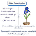 Handcrafted 3D stained glass blue iris flower standing on a wooden base with a brass nameplate, casting colored shadows, perfect Mother's Day desk decor gift.