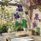 Handmade 3D purple violet stained glass flower casting vibrant colored shadows, available with a custom engraved wooden base or standalone for vase display, perfect for personalized Mother's Day gift and February birth flower desk decor.