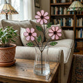 Handcrafted pink cosmos stained glass flower tree standing on a custom personalized engraved wooden base casting colored shadows, perfect October birth flower or Mother's Day desk decor gift.