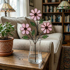 Handcrafted pink cosmos stained glass flower tree standing on a custom personalized engraved wooden base casting colored shadows, perfect October birth flower or Mother's Day desk decor gift.