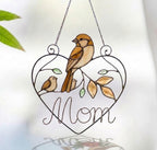 Stained glass cardinal mother and baby bird suncatcher in a heart frame with the word Mom, handmade window hanging gift.