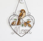 Stained glass cardinal mother and baby bird suncatcher in a heart frame with the word Mom, handmade window hanging gift.