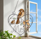 Stained glass cardinal mother and baby bird suncatcher in a heart frame with the word Mom, handmade window hanging gift.