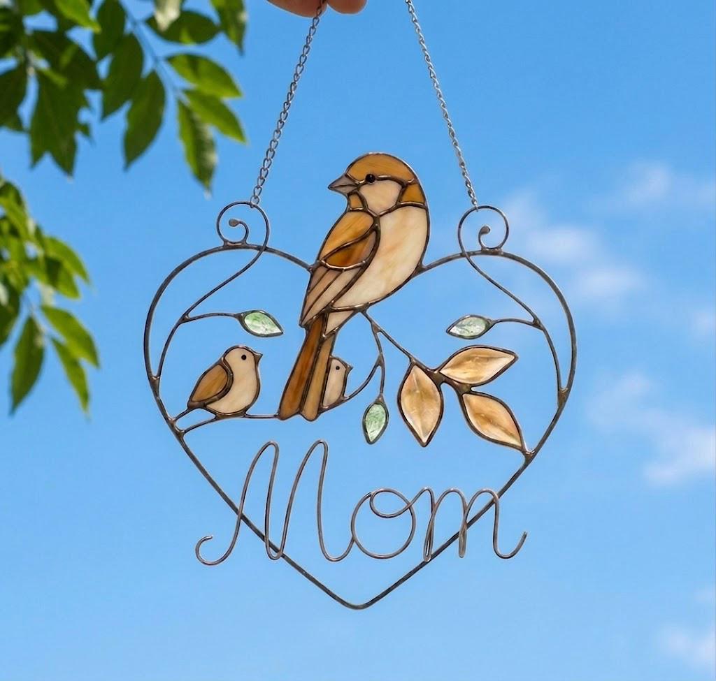 Stained glass cardinal mother and baby bird suncatcher in a heart frame with the word Mom, handmade window hanging gift.