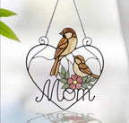 Stained glass cardinal mother and baby bird suncatcher in a heart frame with the word Mom, handmade window hanging gift.